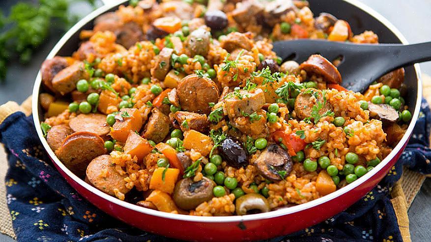 Esta paella valenciana é melhor acompanhada por um bom vinho espanhol Grand Reserve Rioja ou um vinho