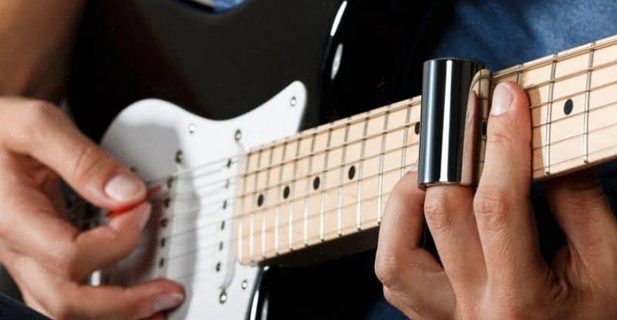 A primeira coisa a fazer é pegar uma guitarra elétrica