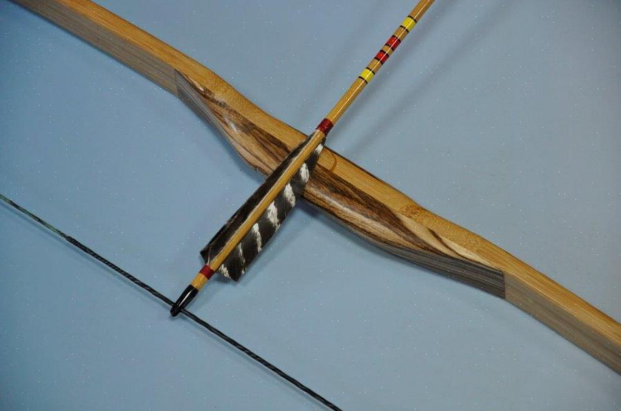 Para fazer um arco simples com duas voltas em seu fabricante de arco de madeira
