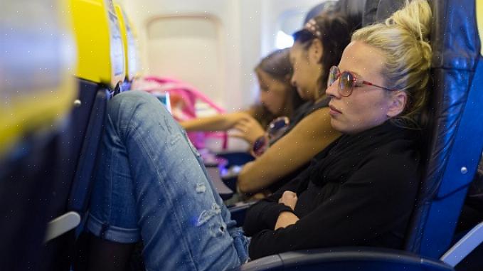 Um grande assento de avião difere de pessoa para pessoa